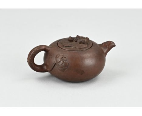 Small old/antique Chinese Yixing teapot with bottom mark. Dimensions: 10.3 x Ø 7 x 2.2 cm. In good condition.