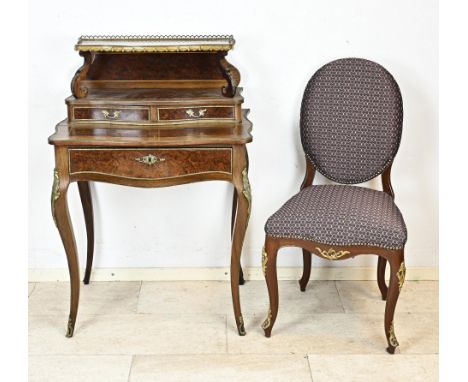 19th century French ladies' desk with rosewood and burl walnut veneer. Desk is completely rimmed with brass. The large drawer