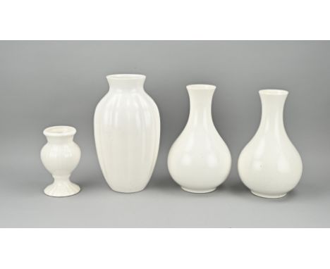 Four Delft white faience vases by Porceleyne Fles. First half 20th century. Size: 15 - 27 cm. In good condition.