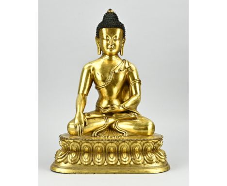 18th Century Chinese gilt bronze Buddha in lotus position, with Kang Xi floral base mark. Size: H 39.5 cm. In good condition.