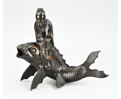 Two-part Japanese bronze figure. Old man sitting on carp. 19th century. Mythology. Meiji. Dimensions: 31x27cm. In good condit