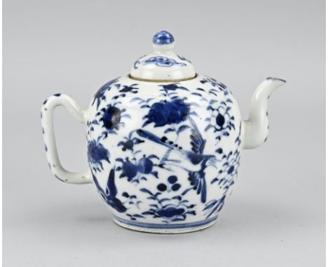 19th century Chinese porcelain teapot with floral/bird/butterfly decoration. Four character bottom mark. Dimensions: 12 x 15 