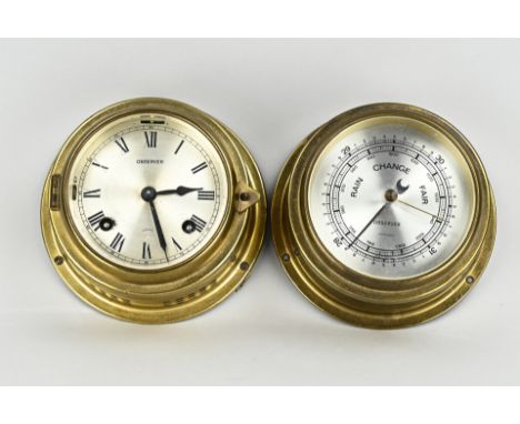 Observer ship's clock + barometer. 20th century. Brass with plated dial. Dimensions: Ø 15 cm. In good condition.