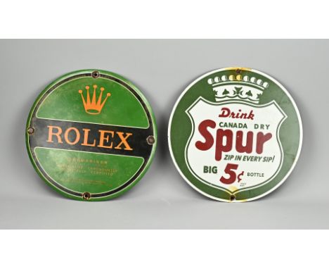 Two old round enamel advertising signs. Rolex Submarine. Drink Canada dry Spur. Dimensions: Ø 30 cm. In reasonable/good condi