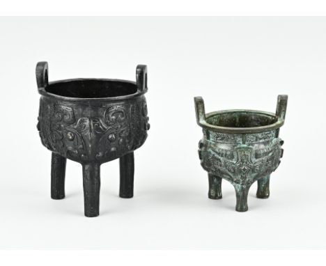Two Chinese bronze incense burners, with symbols. One with bottom mark. Size: 9.5 - 12.5 cm. In good condition.
