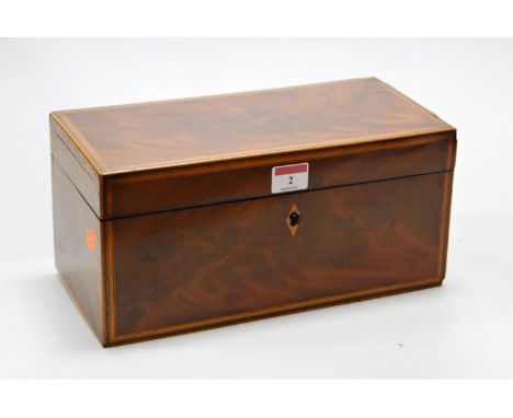 A George III mahogany and satinwood banded tea caddy, of plain rectangular form, the hinged lid opening to reveal twin compar