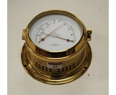 A modern German brass cased thermometer / hydrometer, the dial signed Wempe Chronometerwerke Hamburg, dia.26cm