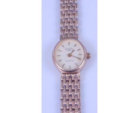 A lady's Rotary 9ct gold cased quartz wristwatch, the back cover inscribed and dated 1990, on integral 9ct gold bracelet, gro