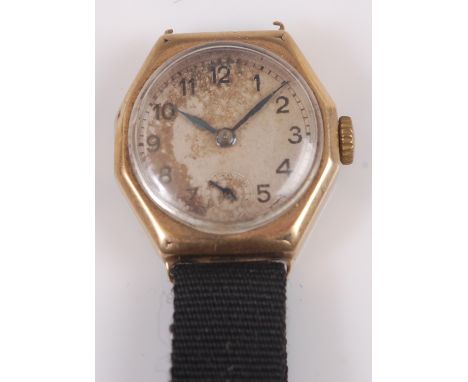 A vintage ladies 9ct gold cased Rolex wrist watch having signed silvered dial, subsidiary seconds dial, Swiss made 15 ruby se
