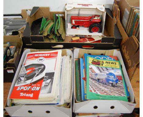 Three boxes containing a quantity of mixed tinplate toys, diecast vehicles and model collecting magazines to include an ERTL 