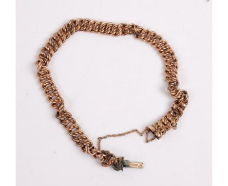 A gilt metal chain link bracelet