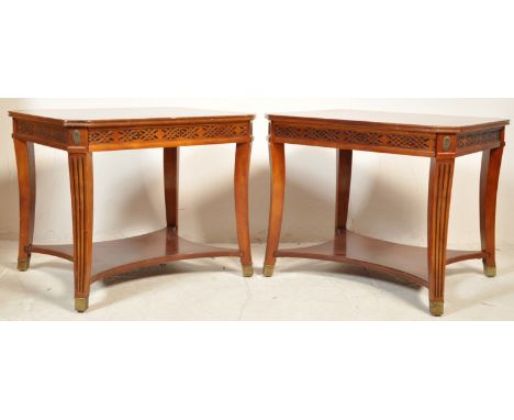 A good pair of Chinese Chippendale Regency revival side / lamp tables. Each table with quarter veneer crossbanded table tops 