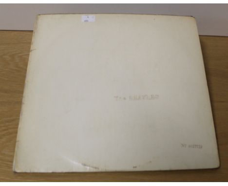 A top opening White by the Beatles - double and numbered - 0017719 - which is relatively low , sleeve is the lower side of VG