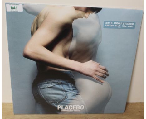 A 2016 press of Placebo's ' sleeping with ghosts ' sealed blue  vinyl wallet gatefold edition vinyl 180g - now a rare record