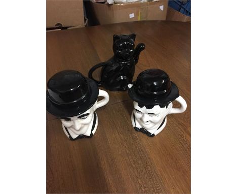 3 ceramic teapots, Laurel and Hardy and a cat