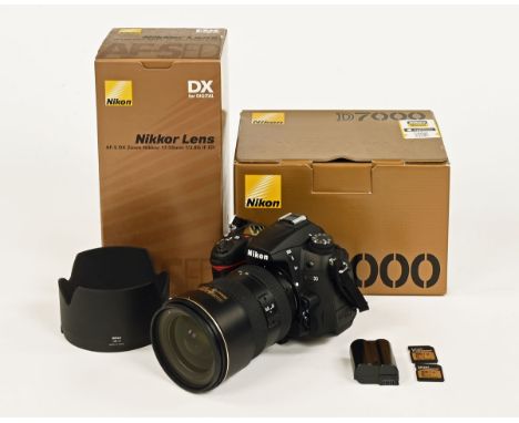 Nikon D7000 camera with Nikkor AF-S 17-55 mm f2.8 GED lens with charger and bag plus box and manual