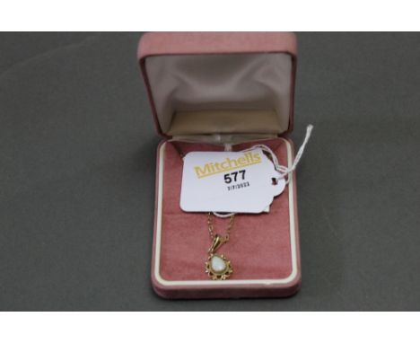 A 9 ct gold opal pendant on chain, weight 3.5 grams 