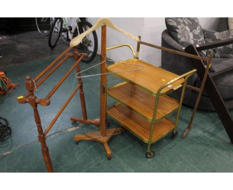 Two towel rails, together with a vintage suit stand and a trolley