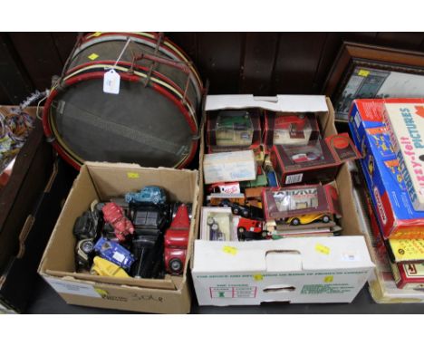 Two boxes of diecast vehicles and ceramic ornamental vehicles   