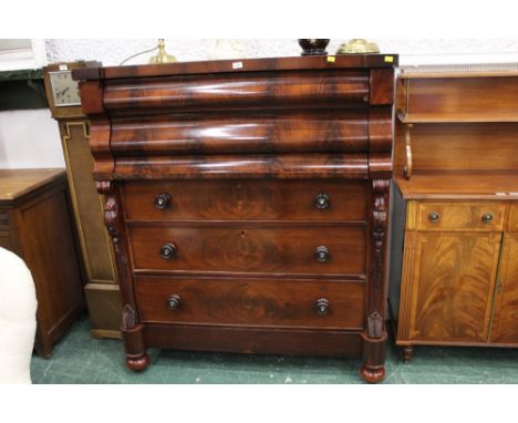 Victorian mahogany Scotch chest of drawers with shallow serpentine frieze drawer, deep serpentine drawer and three graduated 