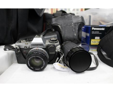 Olympus OM10 35 mm camera and Sigma high speed zoom lens 