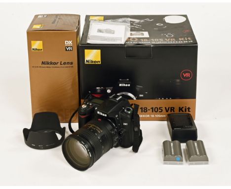 Nikon D90 camera with Nikkor 18-200 mm f3.5 - 5.6 GED lens, charger, bag and manual plus boxes