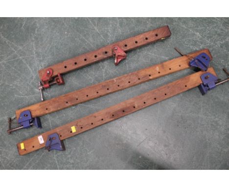 Three sash clamps, ranging from 67 cm to 104 cm