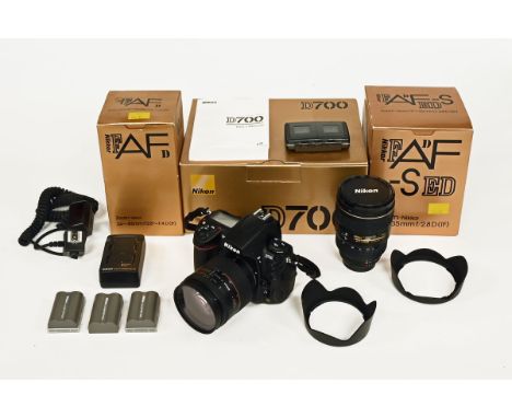 Nikon D700 camera, with a Nikkor AF 24-85 mm f2.8 - 4D lens, a Nikkor AF-S 17-35 mm f2.8 D lens, a charger, memory cards, Nik