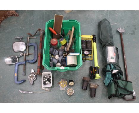 A green tub with double foot pump, vintage car wing mirror, seat belt material, tools, shooting stick and a folding chair 