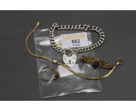 Yellow metal brooch and bracelet and a silver bracelet and padlock 