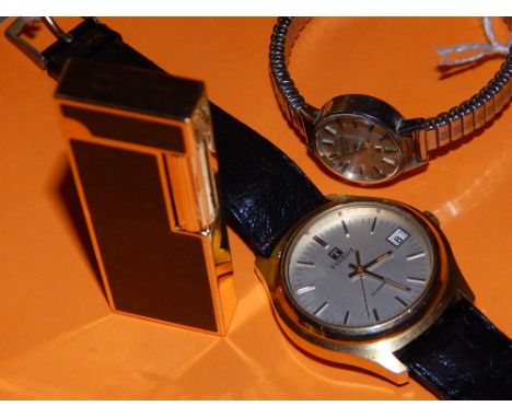 A gentleman's Tissot watch on black leather strap, together with a Tissot white metal watch having articulated strap together