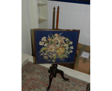 A late 19th century pole screen, with a square floral tapestry panel, H. 99cm