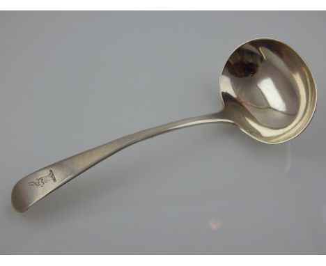 A George III Old English Pattern silver sauce ladle with engraved stag head crest, William Sumner London 1789