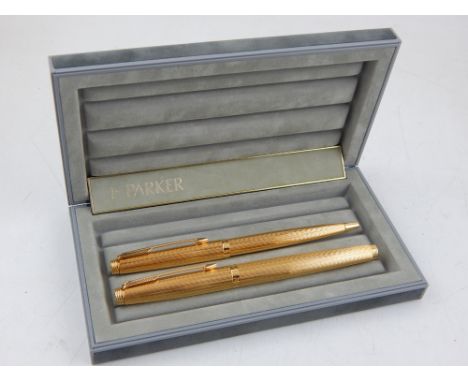 A boxed Parker Premier gold plated fountain and ballpoint pen set.