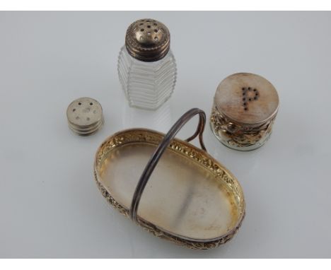 A collection of six white metal trinket dishes, together with a white metal salt and pepper, a small white metal handled tray