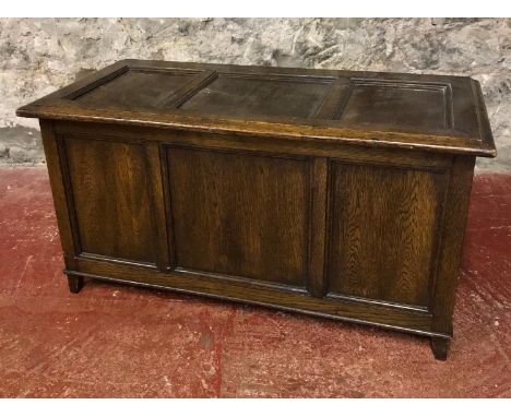 A Dark oak linen trunk 