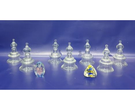 Set of seven glass inverse bell-shaped candle holders with a single gilt metal wall bracket and two glass paperweights (9)