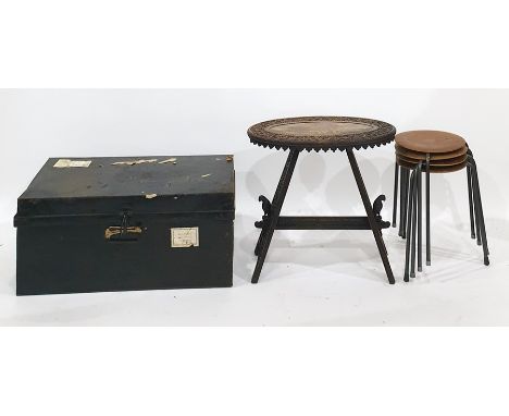19th century carved oak oval top table on trestle-style supports, a tin trunk and a set of four stools (6) 