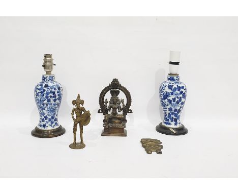 Two similar Chinese porcelain blue and white baluster vases mounted as lamps, four-character marks, each painted with scrolli