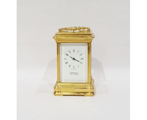 Martin & Co of Cheltenham 20th century carriage clock with Roman numerals to the dial, white metal flower ornament 