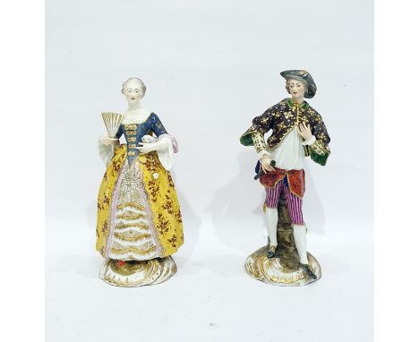Pair Stephenson & Hancock Derby porcelain figures of lady and gentleman, the lady holding a fan and lap dog, on rococo base, 