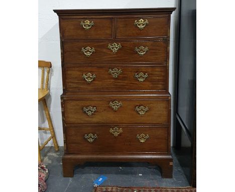 Georgian mahogany chest on chest with moulded cornice above two short and two long drawers, on a base of two long drawers, to