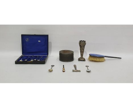 Quantity of silver-plate to include enamel-backed clothes brush, souvenir spoons, tin box, etc 