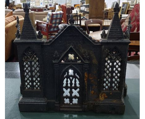 Cast iron fireguard in the architectural Gothic taste and flatware 