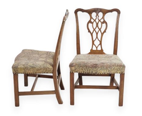 A pair of George III Chippendale style mahogany dining chairs with carved interlaced splats, padded seats and moulded squared