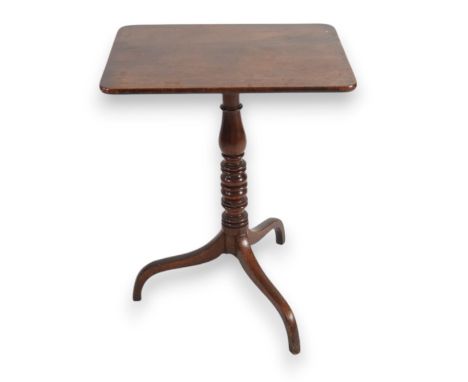 A Regency mahogany tilt top occasional table with rounded rectangular top and turned stem on downswept tripod, 459cm wide, 45