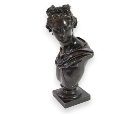 After the antique, a late 19th century Italian bronze bust of Apollo Belvedere, upon integral square plinth, 29cm high  A lit