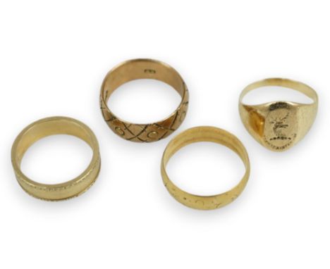 An 18ct gold wedding band, 4.3 grams, two 9ct gold wedding bands, 10 grams and a 14k intaglio signet ring, 3.9 grams.  Minot 