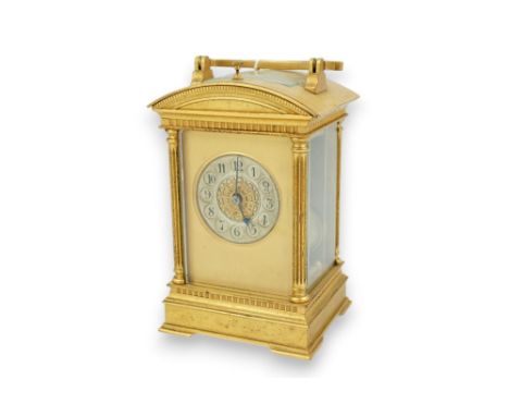 An early 20th century French ormolu hour repeating carriage clock in arched case, with silvered arabic dial and eight day mov