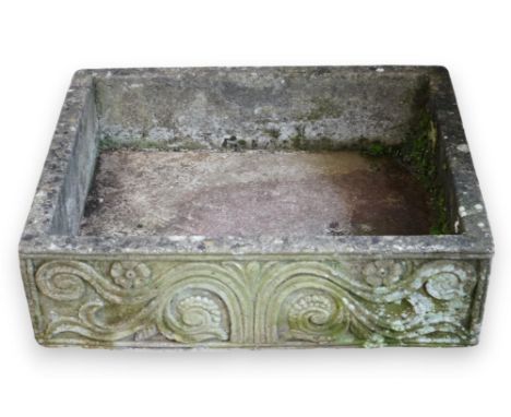 A rectangular reconstituted stone garden trough, with scroll and flower decoration, 75cm wide, 60cm deep, 24cm high  Weathere